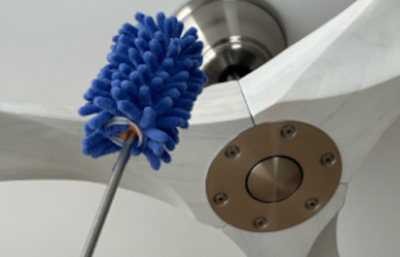 Cleaning your ceiling fan with a duster